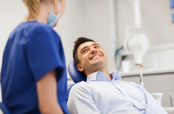 Relaxed, smiling patient in the dental chair